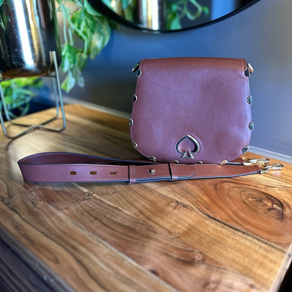 Kate Spade Cinnamon spice brown saddle bag with scalloped metal accents